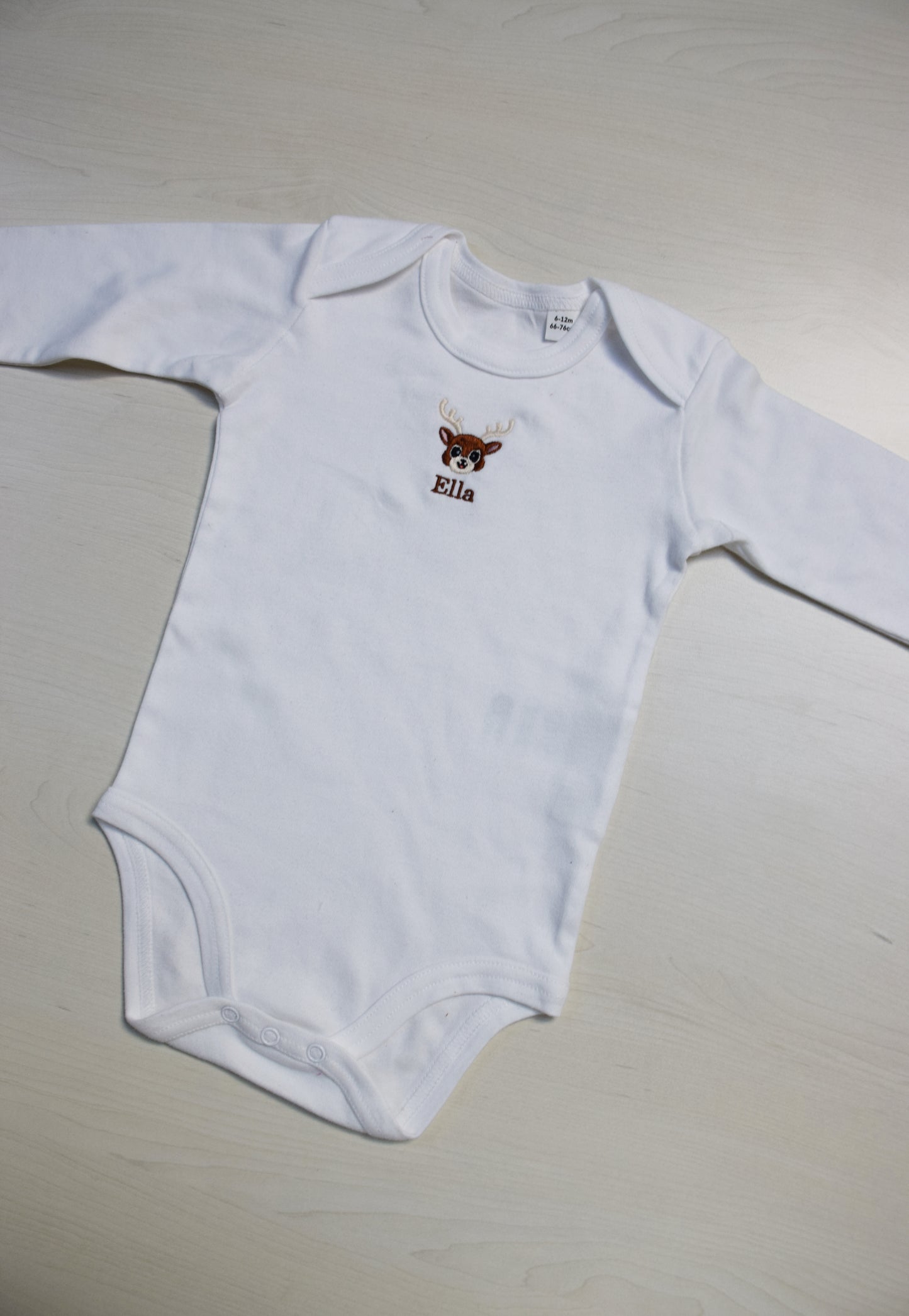 Baby longsleeve romper met figuurtje en naam