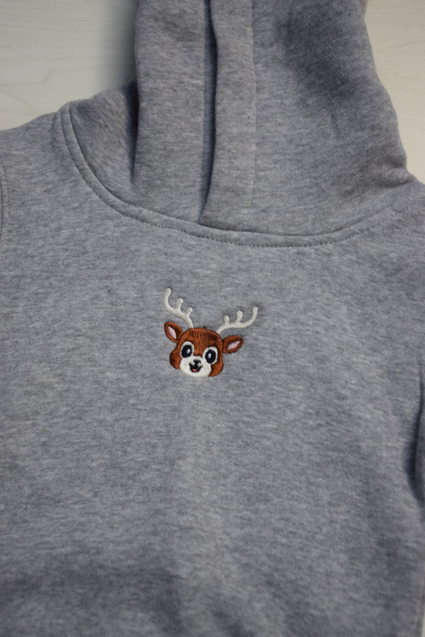 Baby hoodie met figuurtje