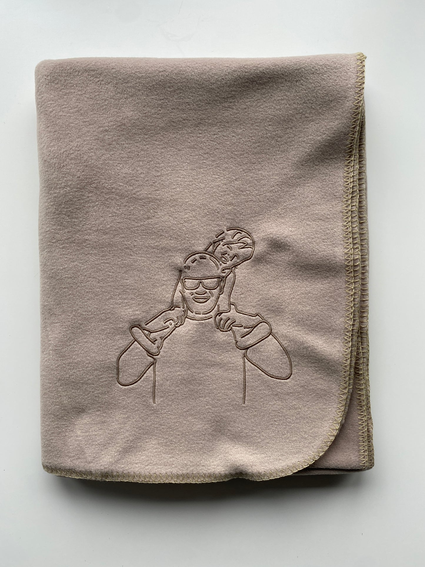 Fleece deken met contrastrand